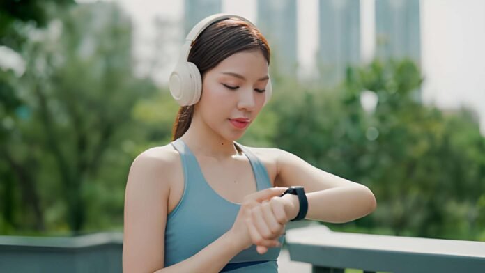 User reviewing stress levels on wearable health device.