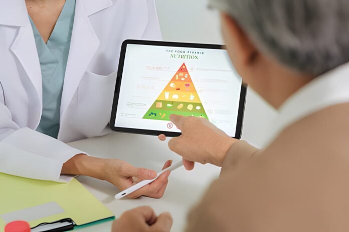 Health literacy Healthcare professional helping a patient understand health information.