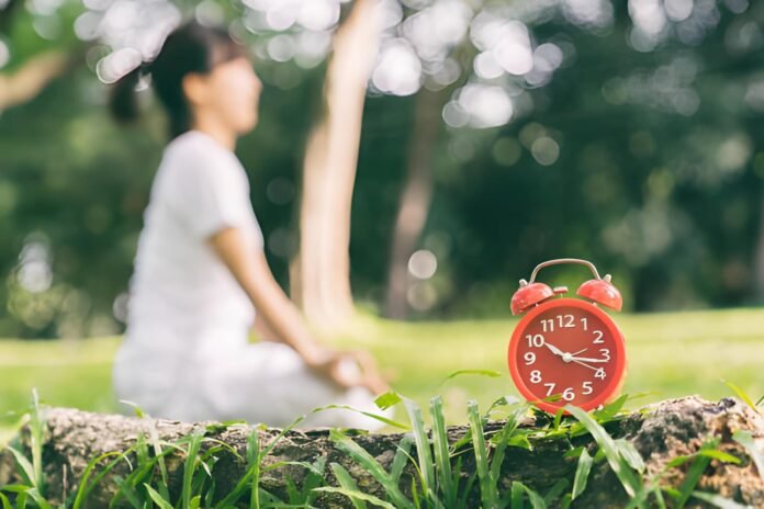 Time wealth A person relaxing in a park.
